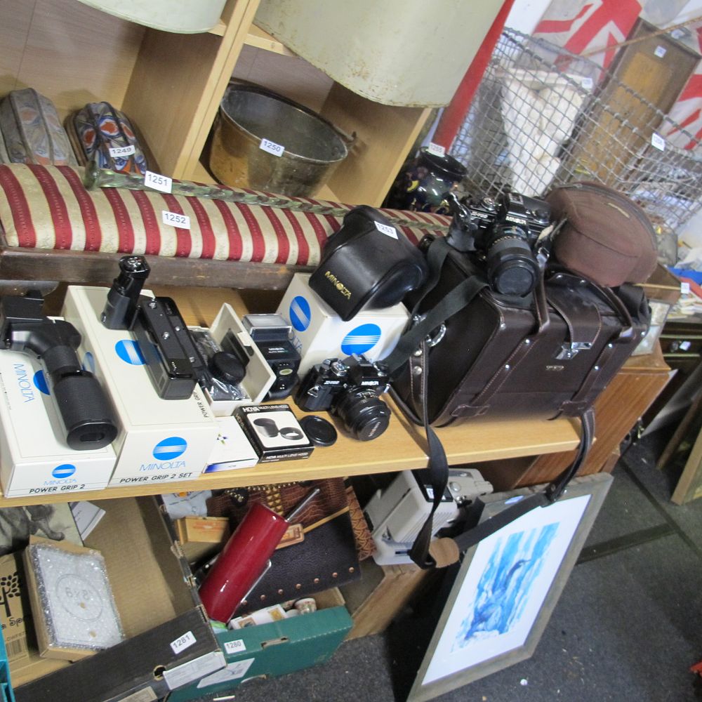 Lot 1253: 2 x Minolta X300 SLR camera outfits