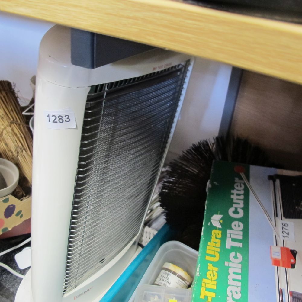 Lot 1283: oscillating fan heater