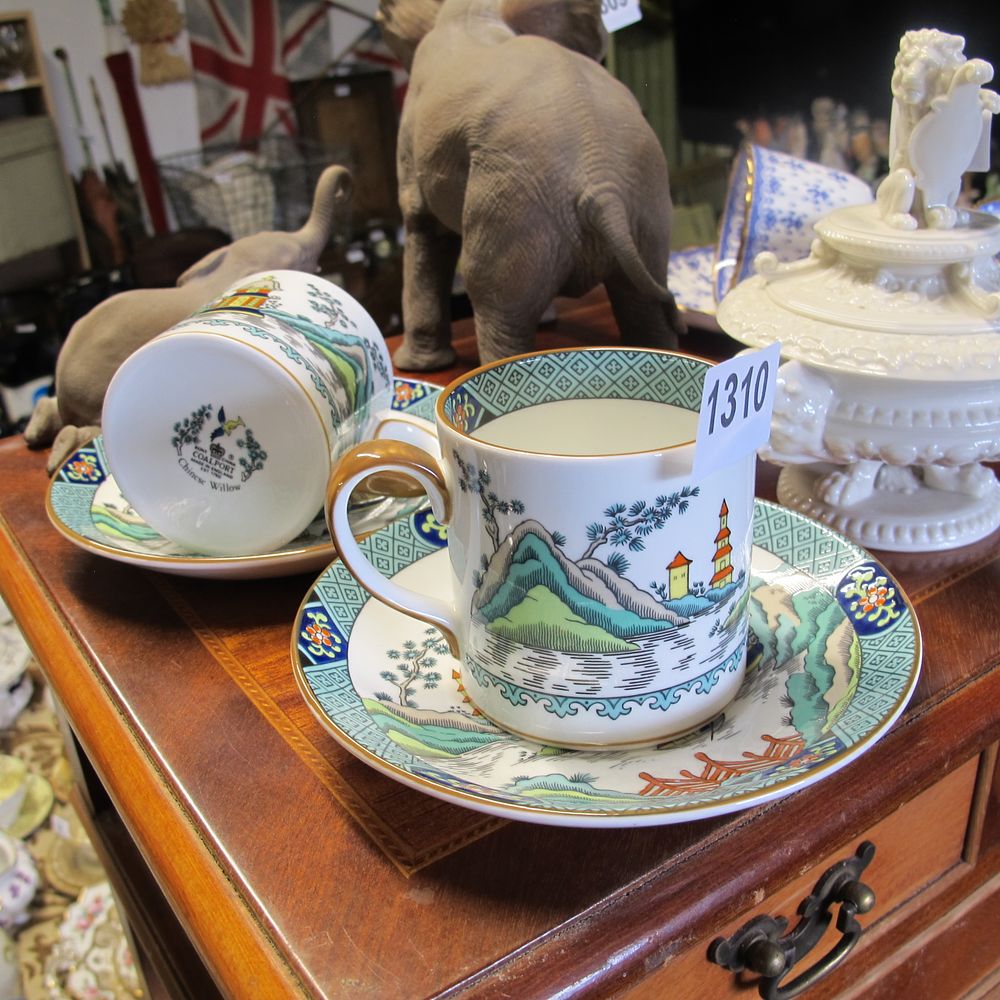 Lot 1310: 2 oriental coffee cups made by coal port