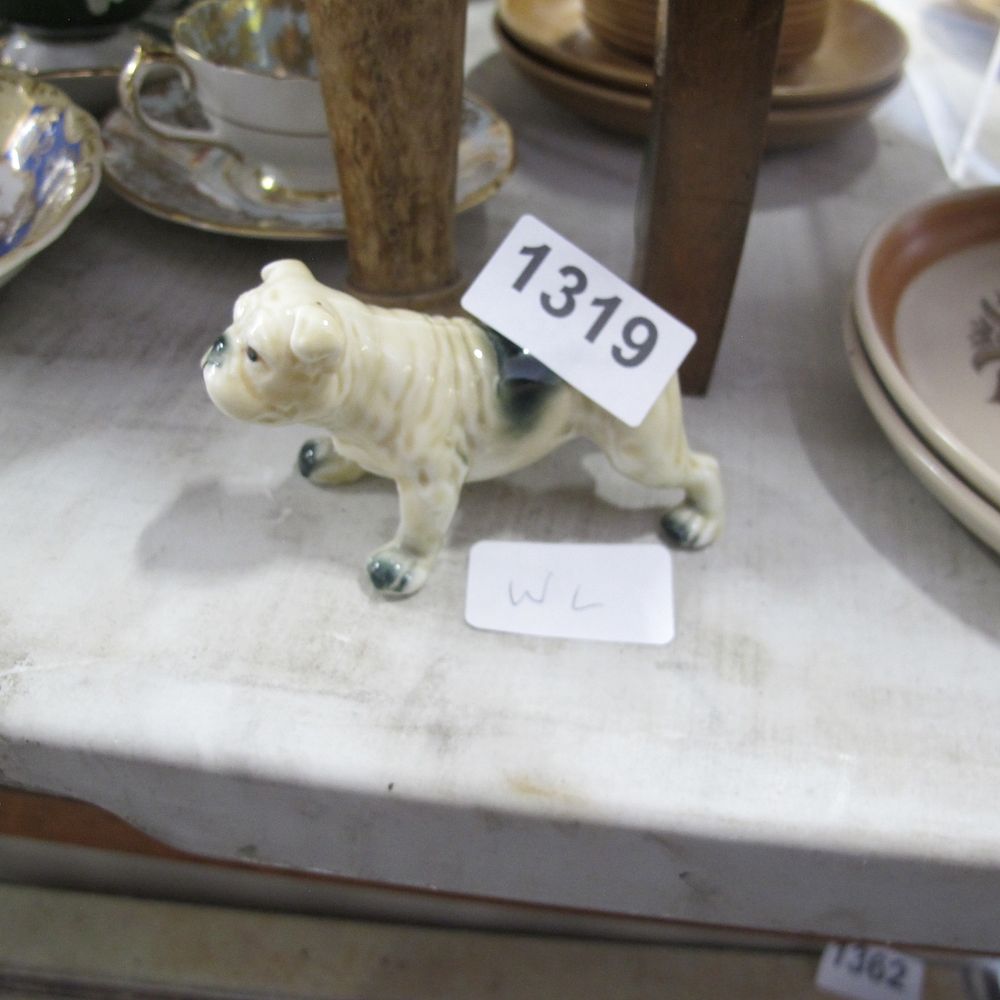 Lot 1319: A small ceramic bulldog