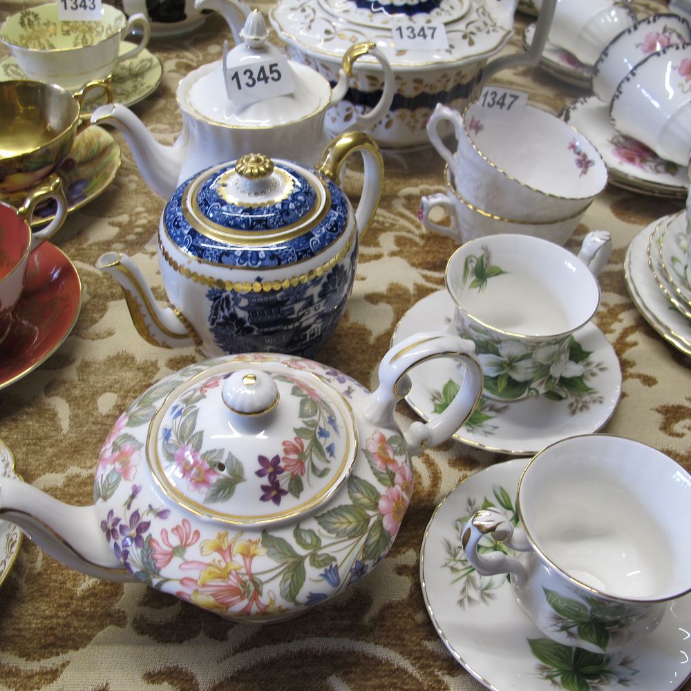 Lot 1345: Three teapots including Paragon Brandbach and Royal Albert