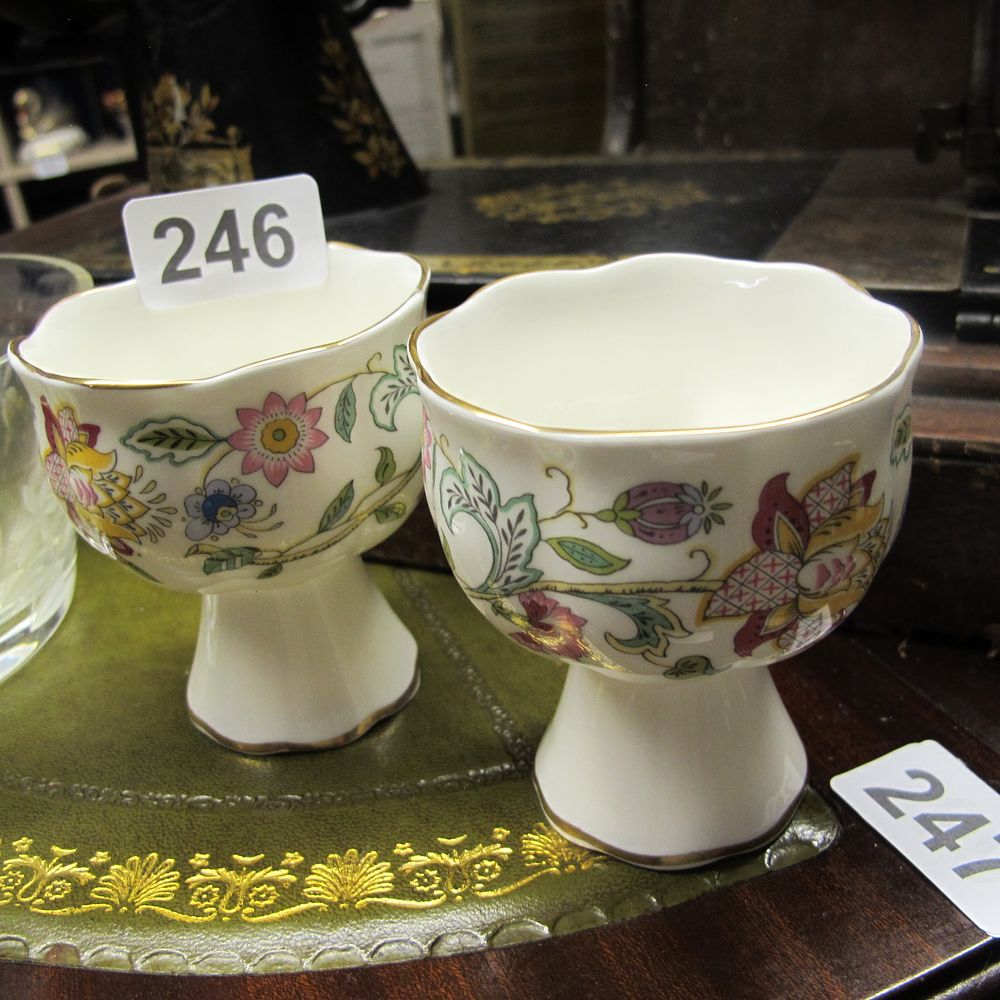 Lot 246: Pair of Minton ceramic flower urns 