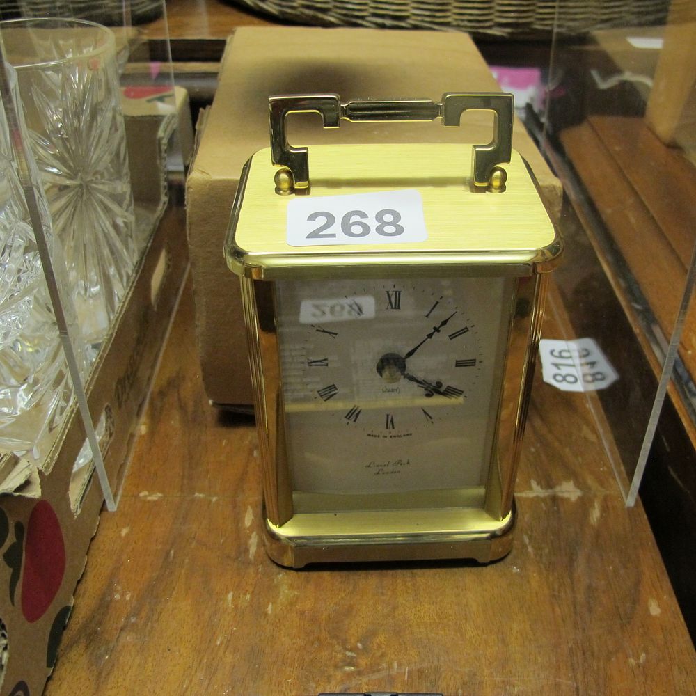 Lot 268: Lional peck quartz crriage clock 