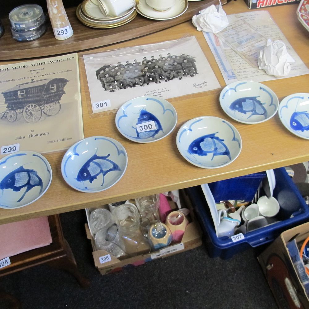 Lot 300: Six hand painted fish motif dishes  