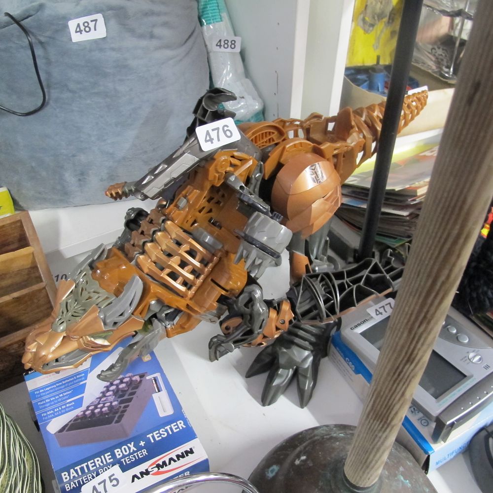 Lot 476: Transformers age of extinction dinosaur very collectable