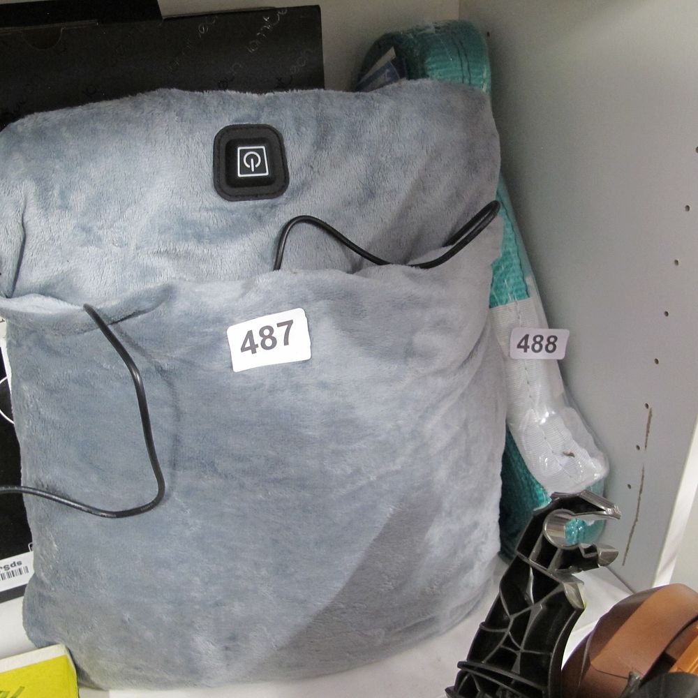 Lot 487: plug in foot warmer