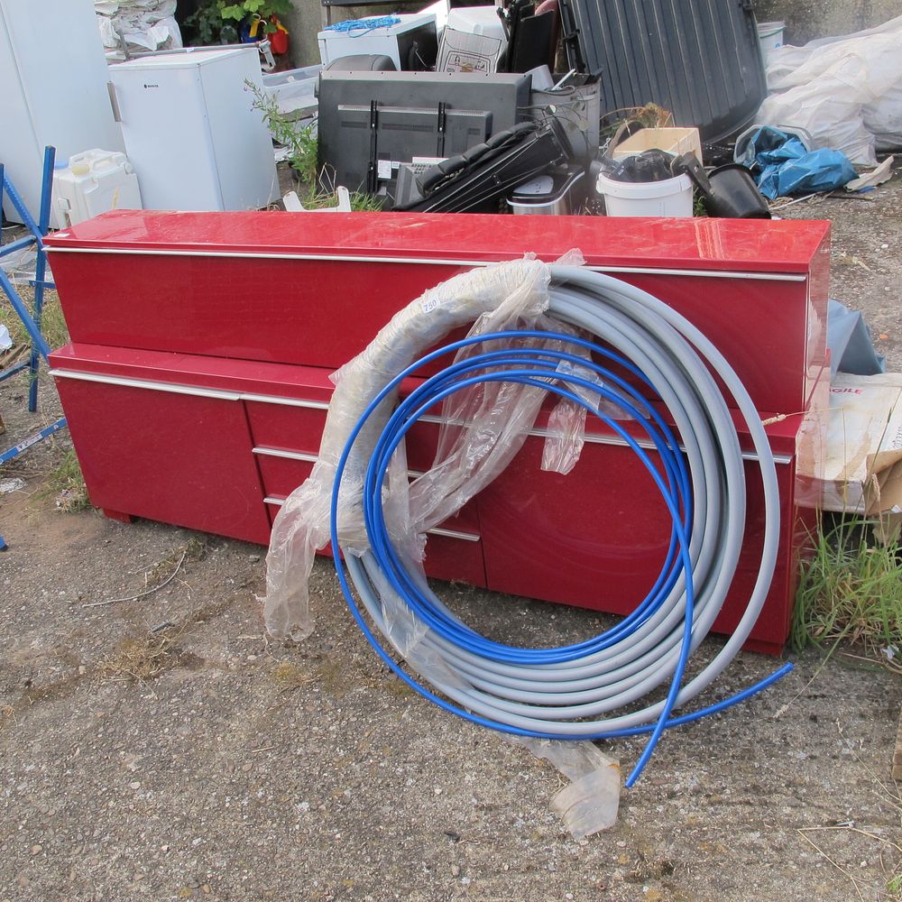 Lot 749: red coated 2 piece media stand and over...