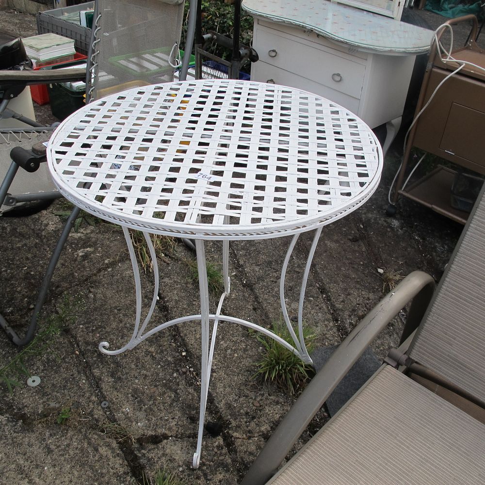 Lot 764: French Metal lattice topped garden table