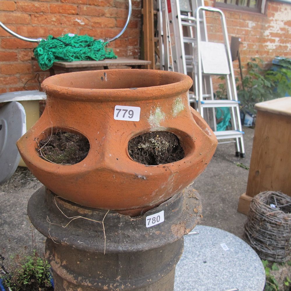 Lot 779: Terracotta strawberry / tuber planter