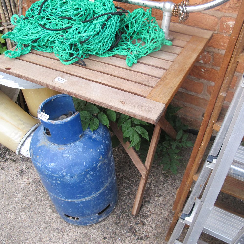 Lot 828: wooden fold away garden table
