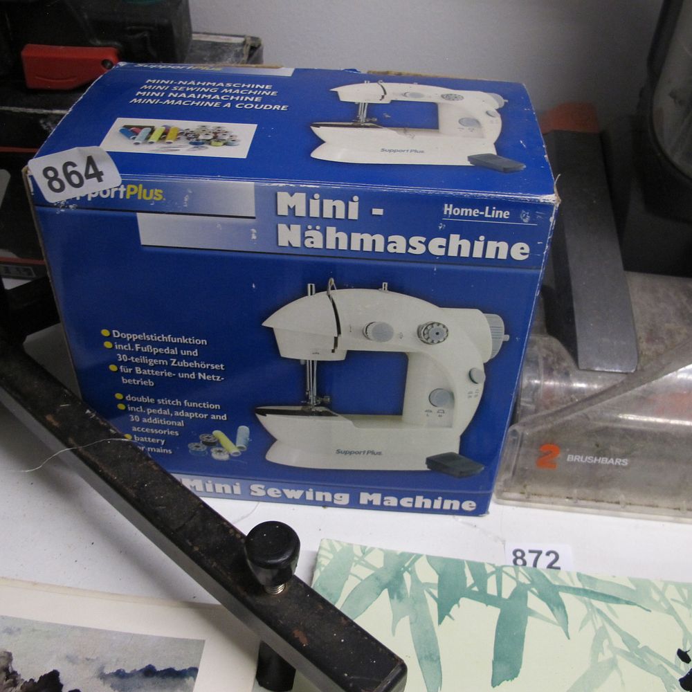 Lot 864: miniature sewing machine ideal for making budgie smugglers