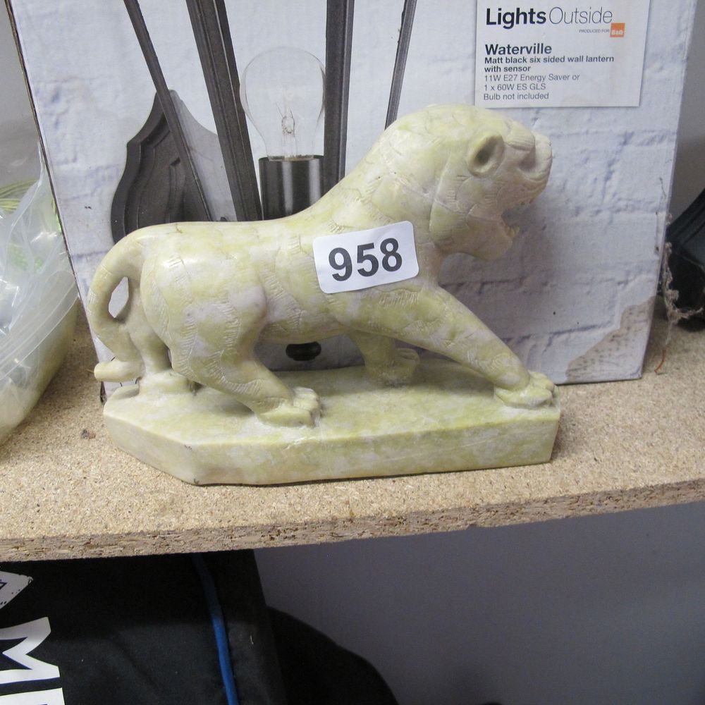 Lot 958: onyx lion ornament