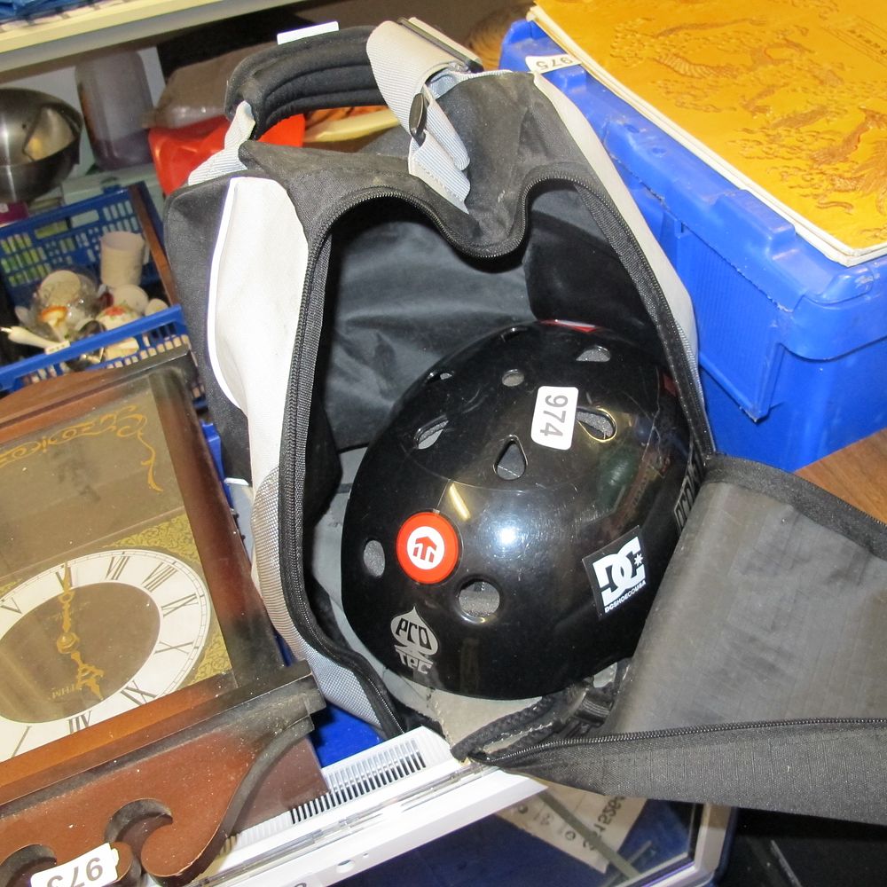 Lot 974: skaters helmets and bag