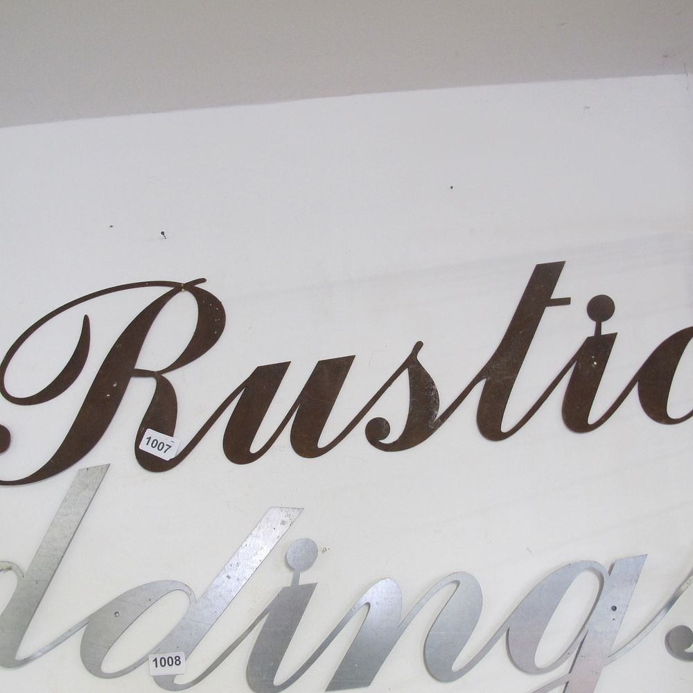 Lot 1007: Metal wall hanging ‘Rustic’ sign 