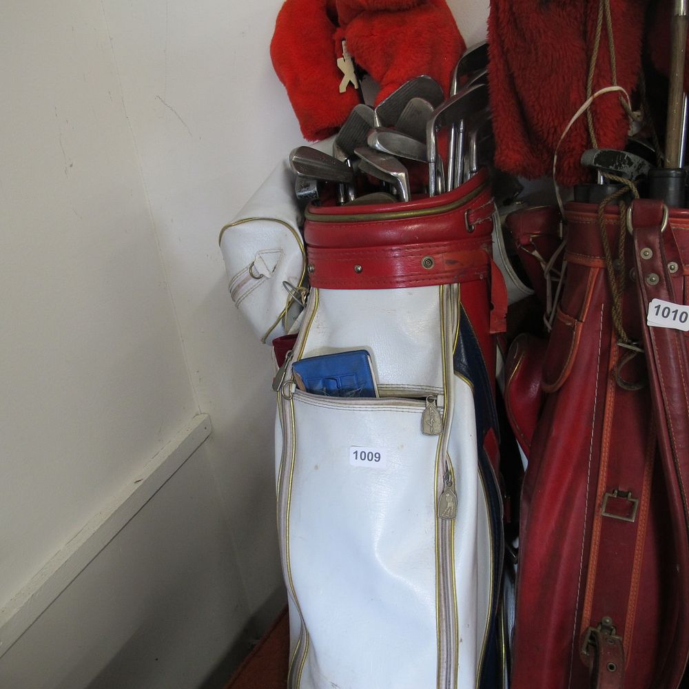 Lot 1009: Leather golf club bag and golf clubs 
