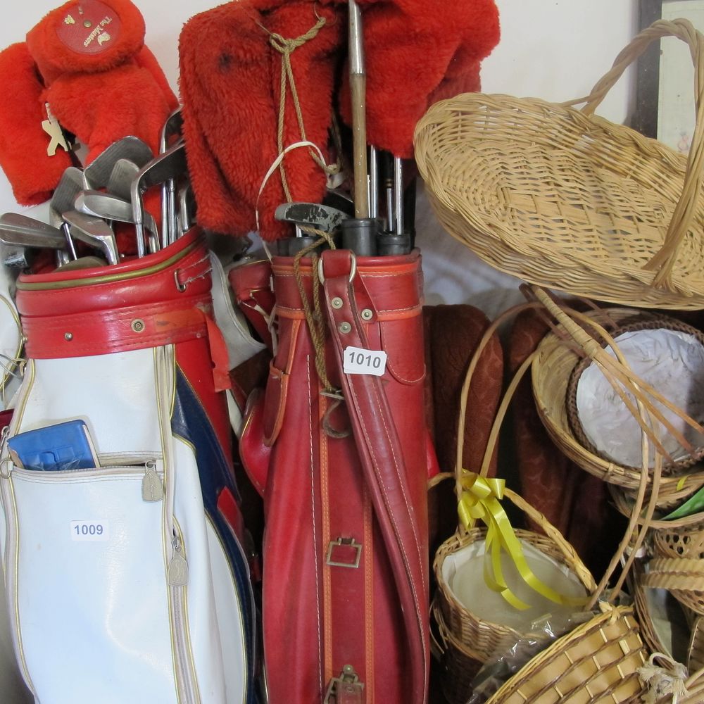 Lot 1010: Leather golf bag and golf clubs 