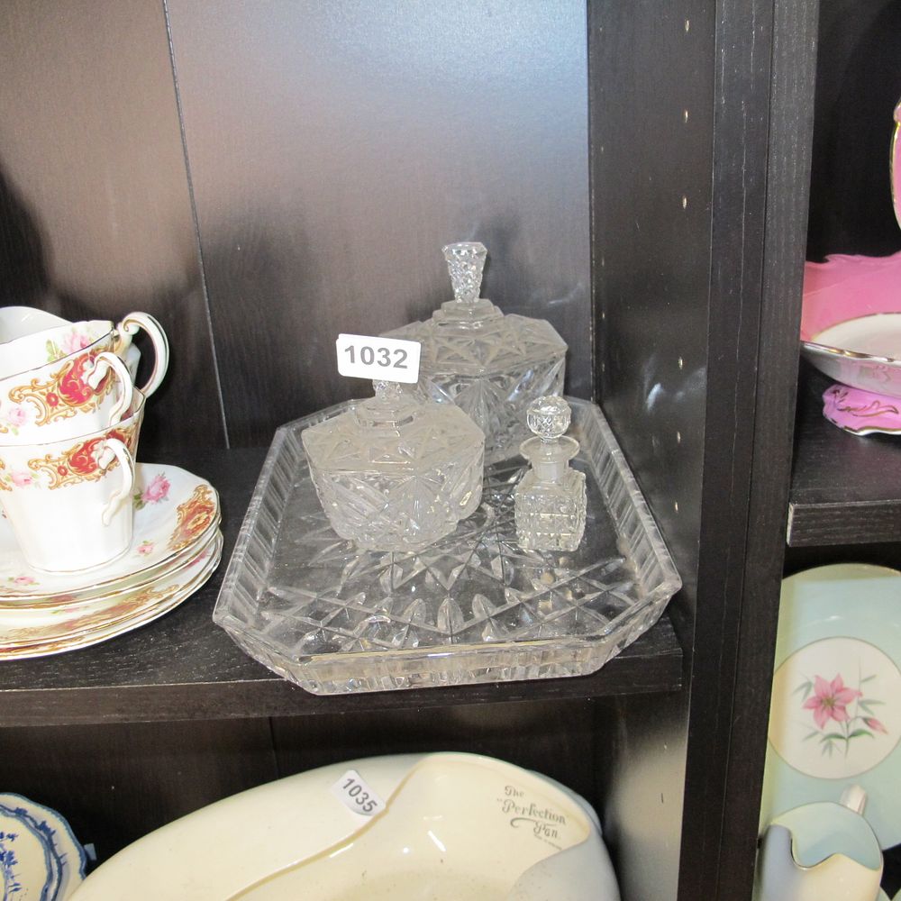 Lot 1032: Cut glass dressing table sets 