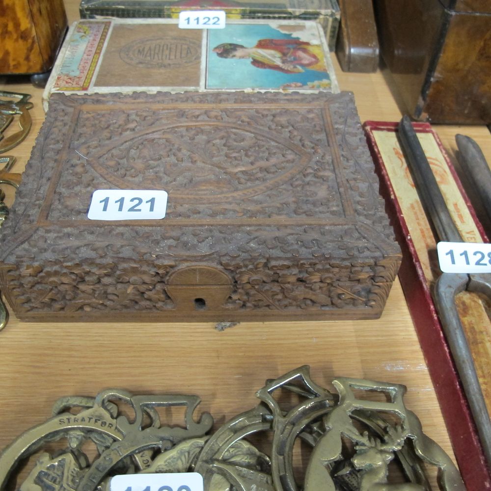 Lot 1121: Heavily carved decorative wooden box
