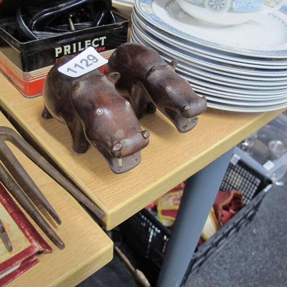 Lot 1129: 2 wooden African hippos