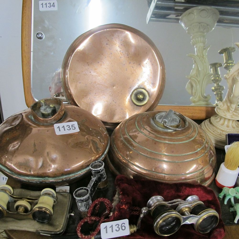 Lot 1135: Foot warmers