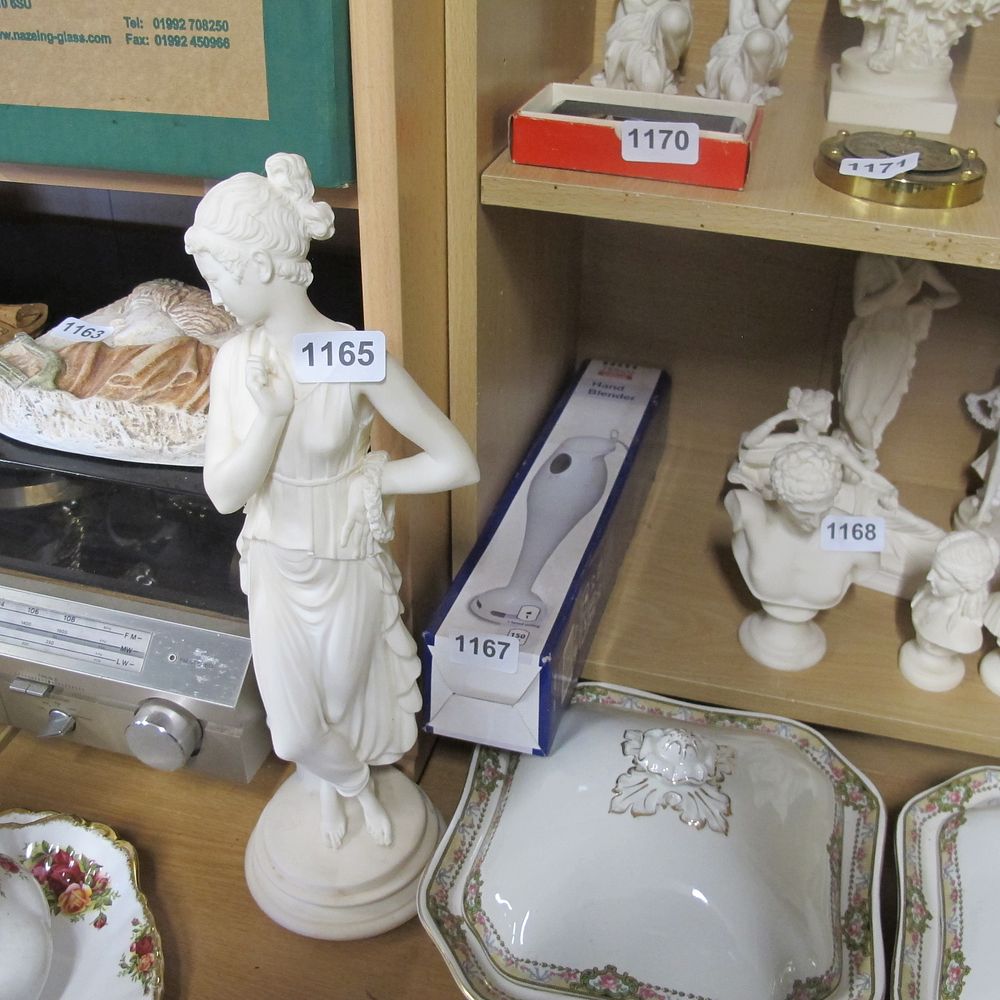 Lot 1165: Standing lady figurine