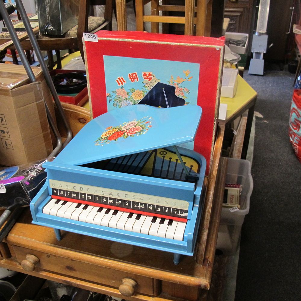 Lot 1246: Boxed childs piano