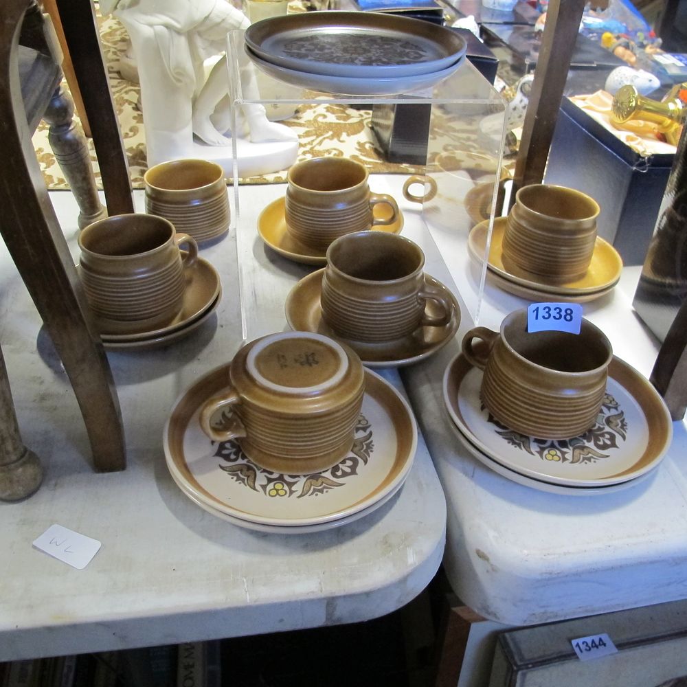 Lot 1338: Denby cups and saucers