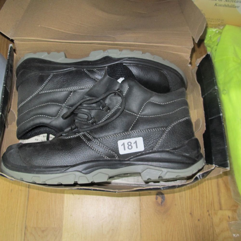 Lot 181: a pair of black Hi - top steel...