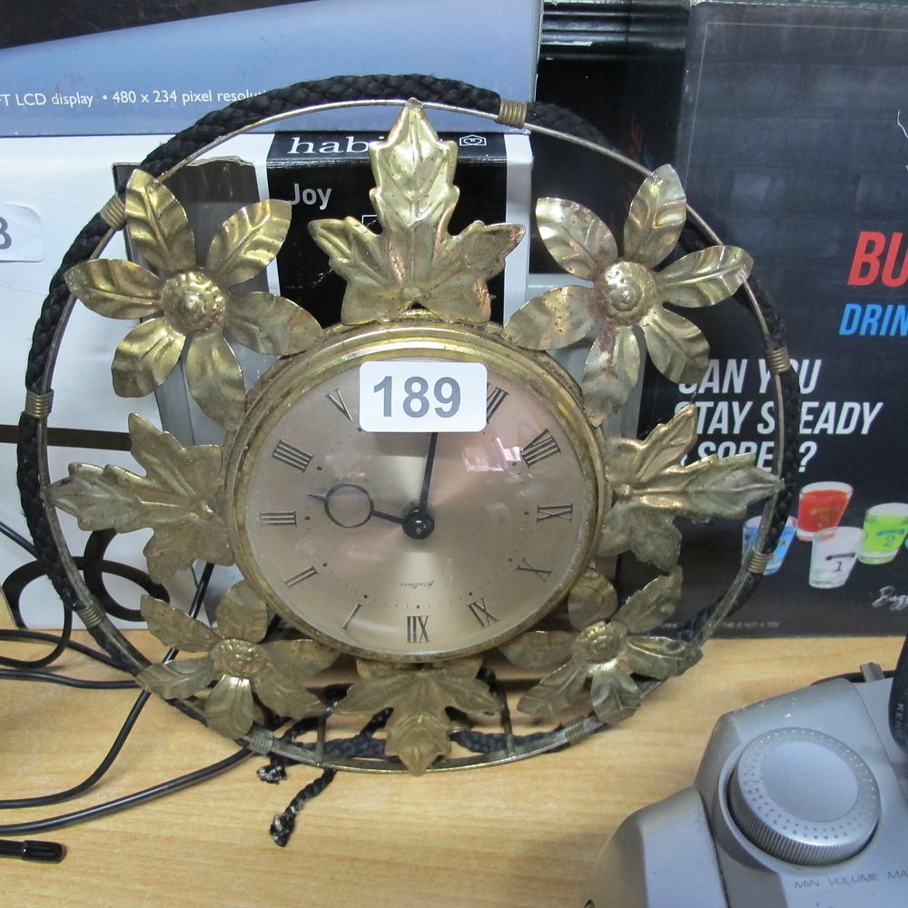 Lot 189: vintage mid century electric wall clock