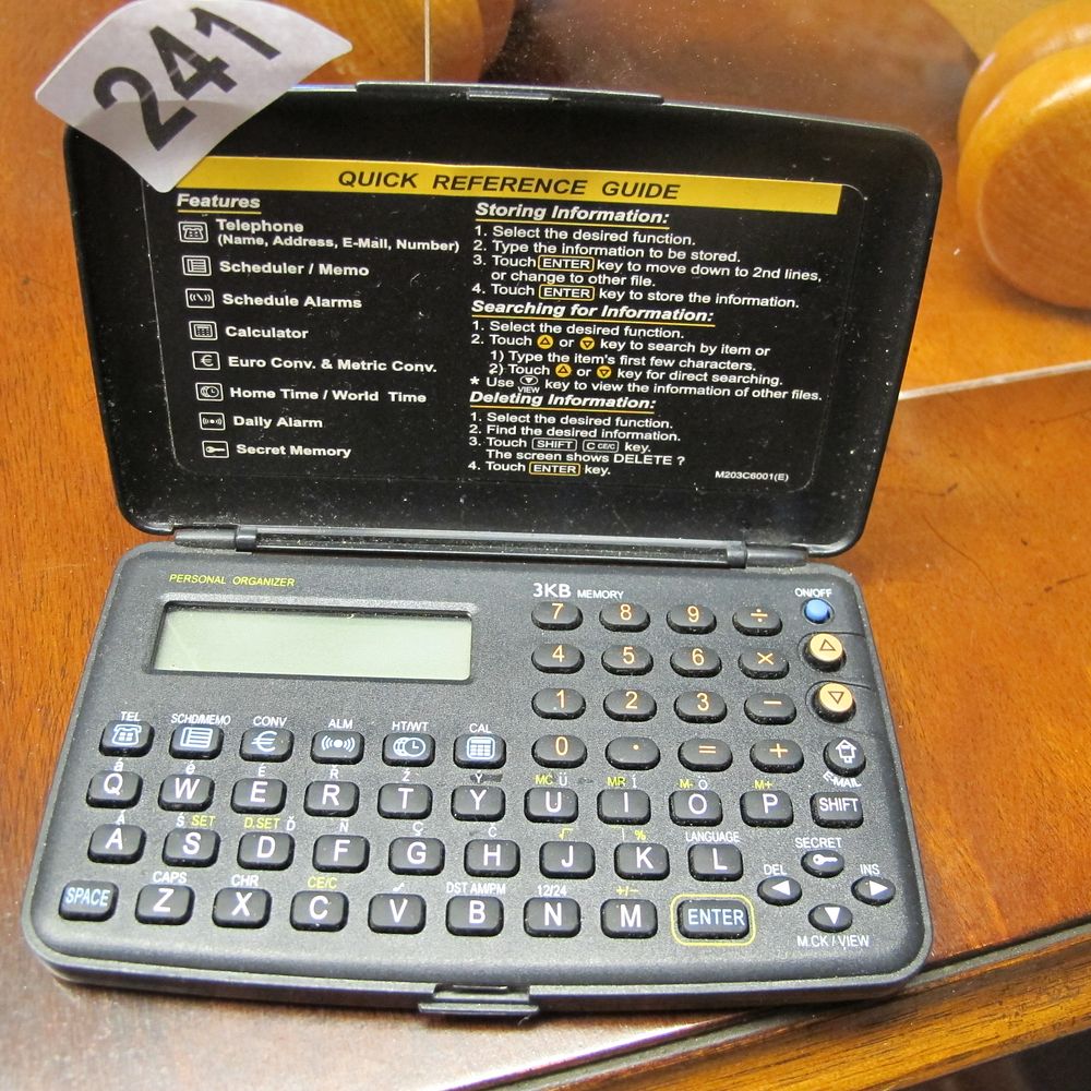 Lot 241: retro personal organiser
