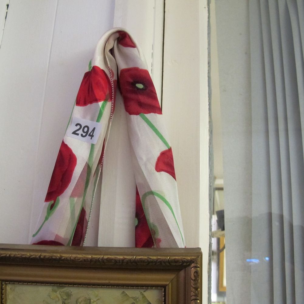 Lot 294: ladies scarf featuring poppies