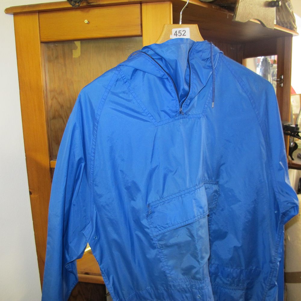 Lot 452: Large rain poncho