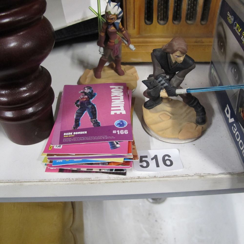 Lot 516: Fortnite cards and Star Wars figures