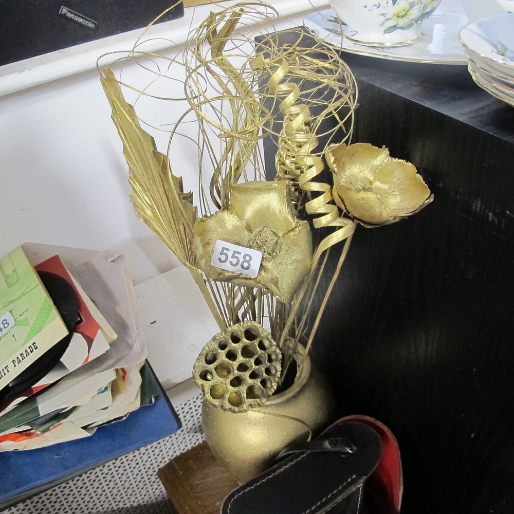 Lot 558: Gold flowers and vase
