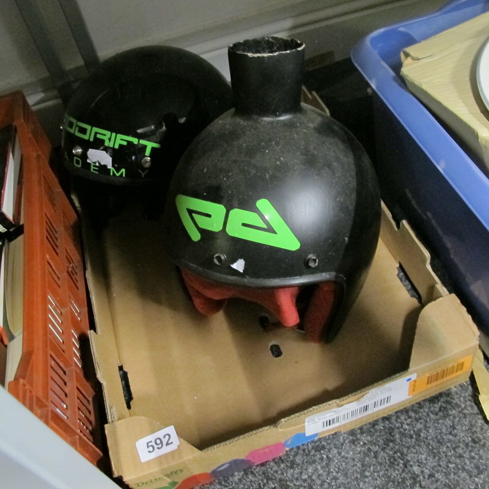 Lot 592: 2 crash helmets