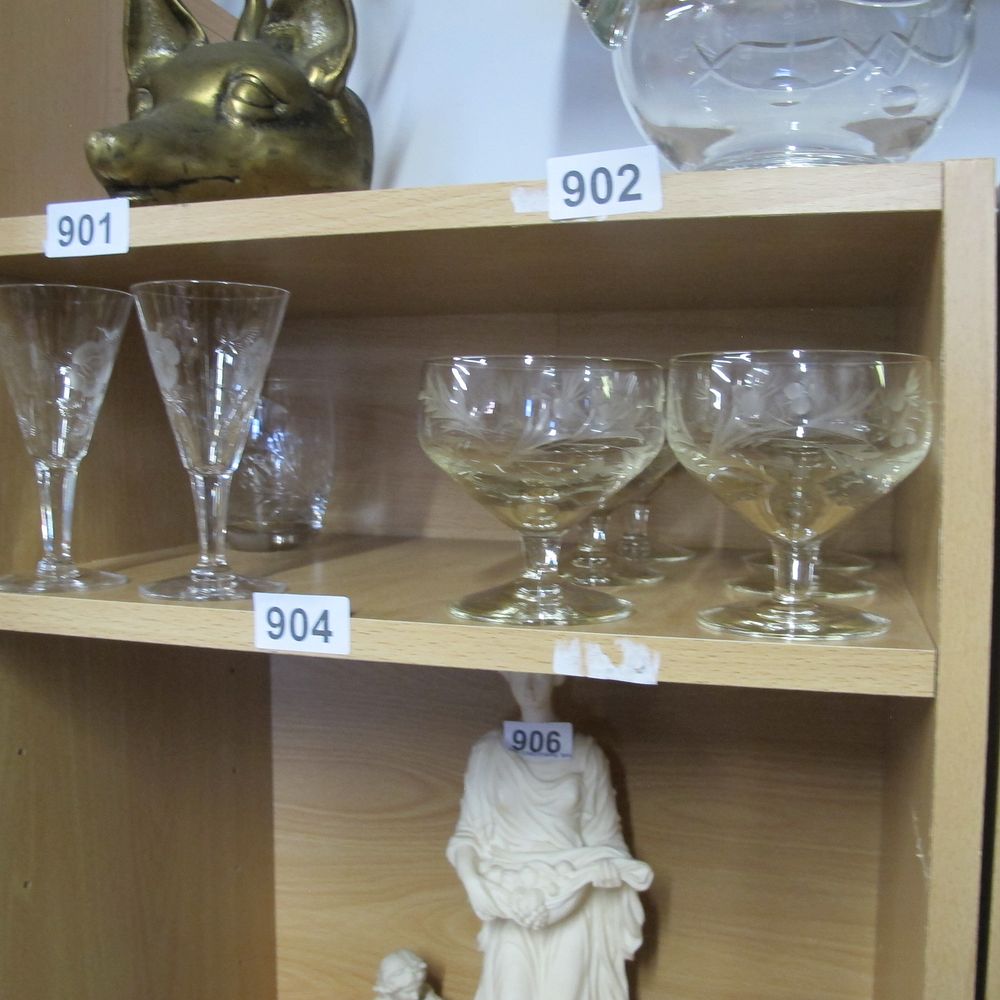 Lot 904: Shelf of glasses