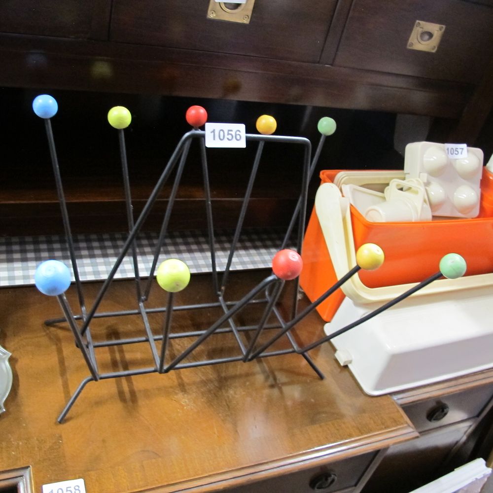 Lot 1056: Atomic magazine rack