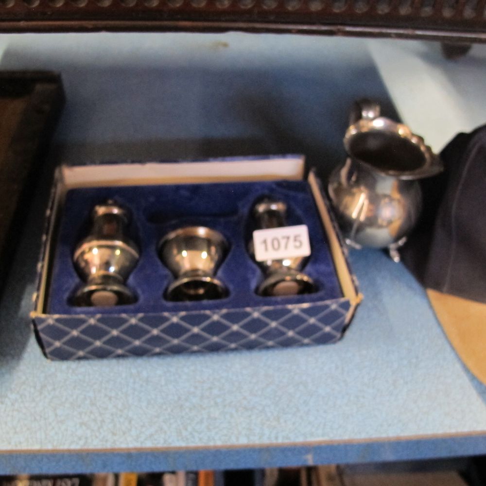 Lot 1075: Silver plated cruet set