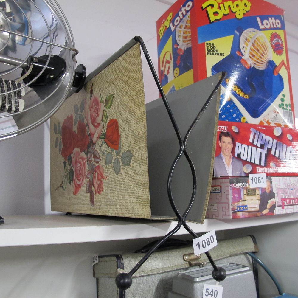 Lot 1080: Mid-century metal magazine rack