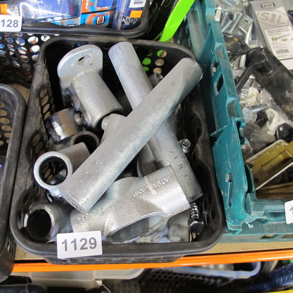 Lot 1129: tub of scaffolding bits