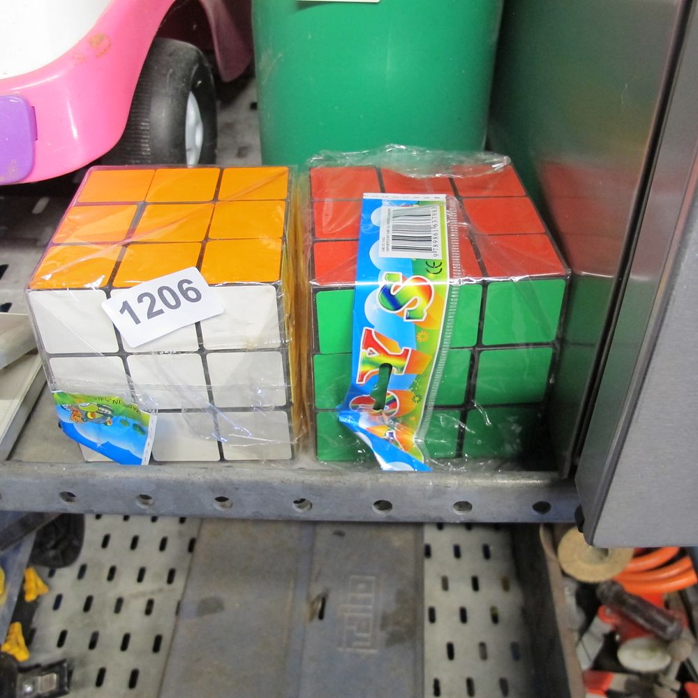 Lot 1206: 2 rubiks cubes