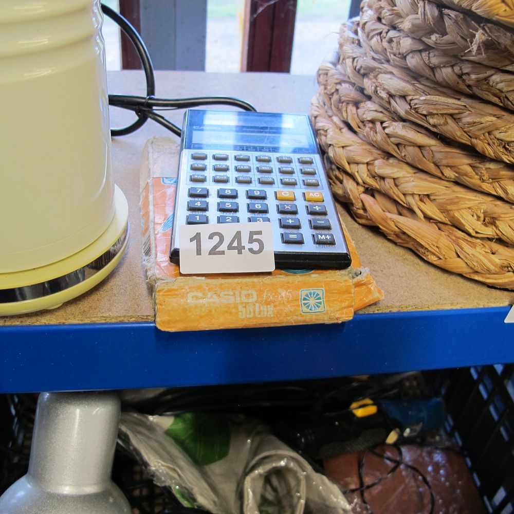 Lot 1245: casio calculator