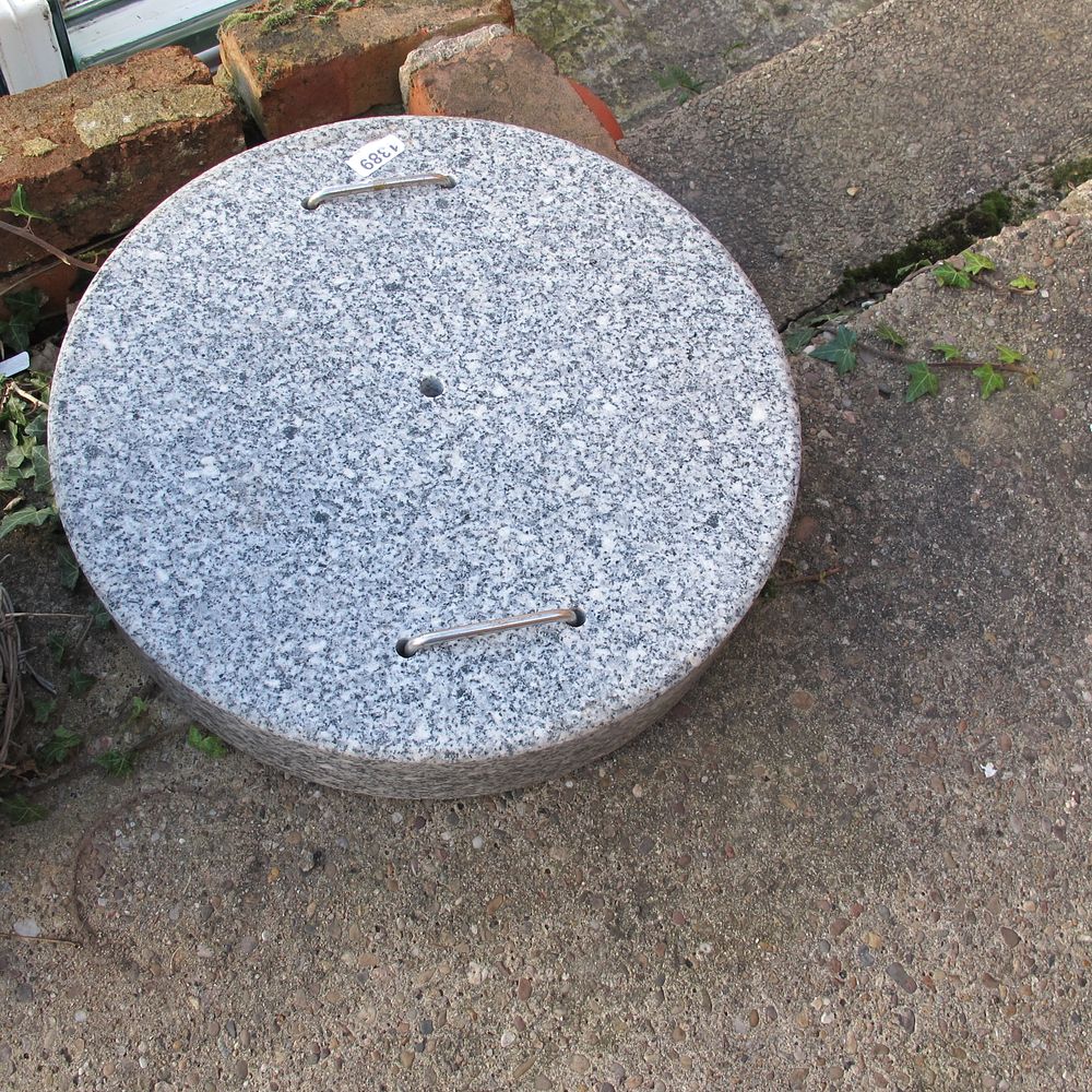 Lot 1389: large marble weight for chaining a bike to