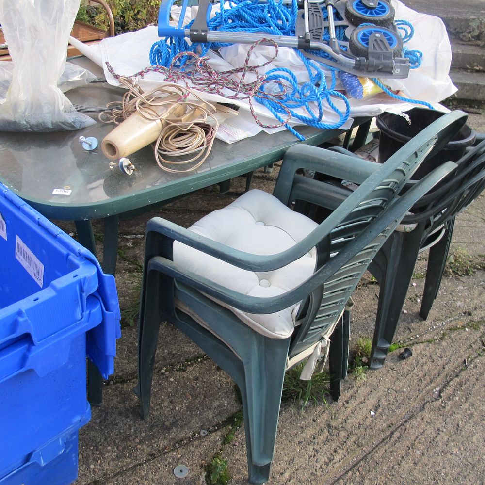 Lot 1396: garden table and chairs