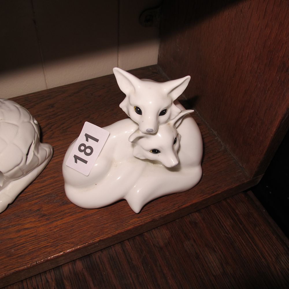 Lot 181: cuddling fennec foxes