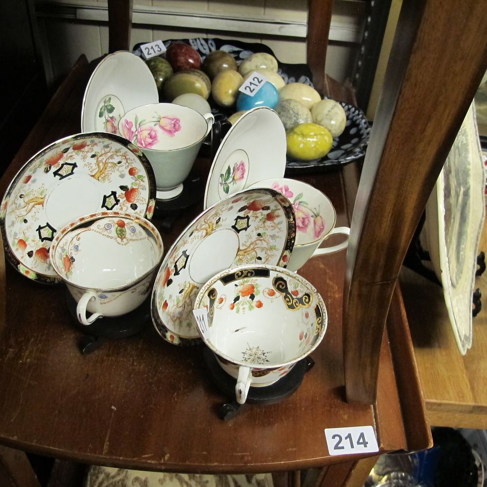Lot 211: cups and saucers
