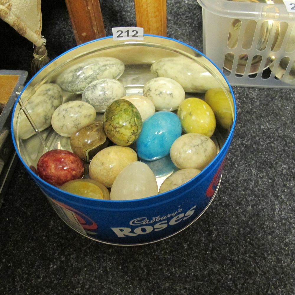 Lot 212: tin of onyx eggs
