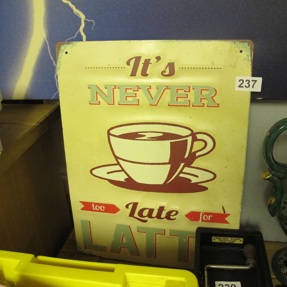 Lot 237: metal latte wall art