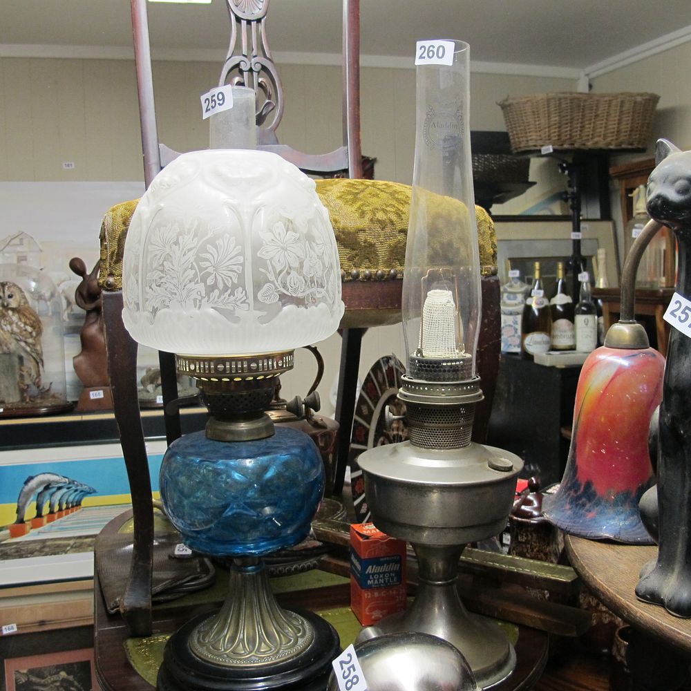 Lot 260: metal oil lamp