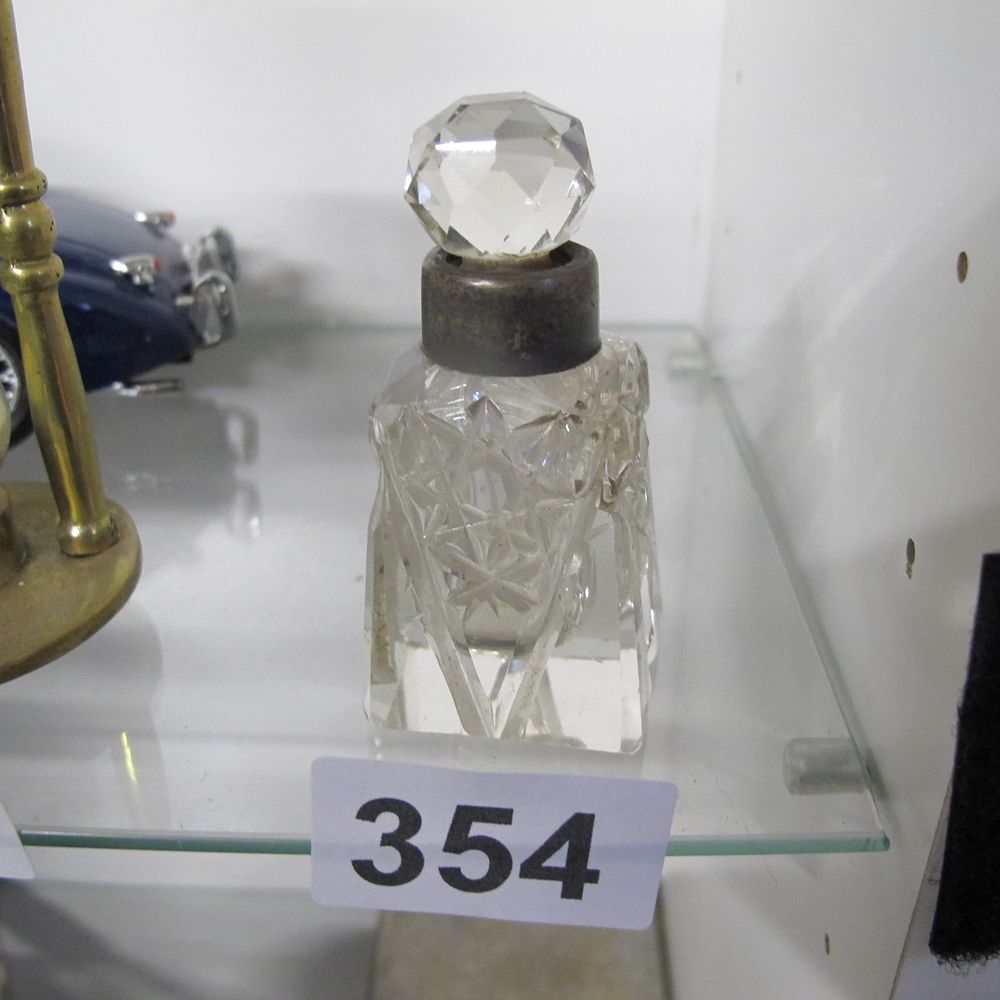 Lot 354: cut glass perfume bottle